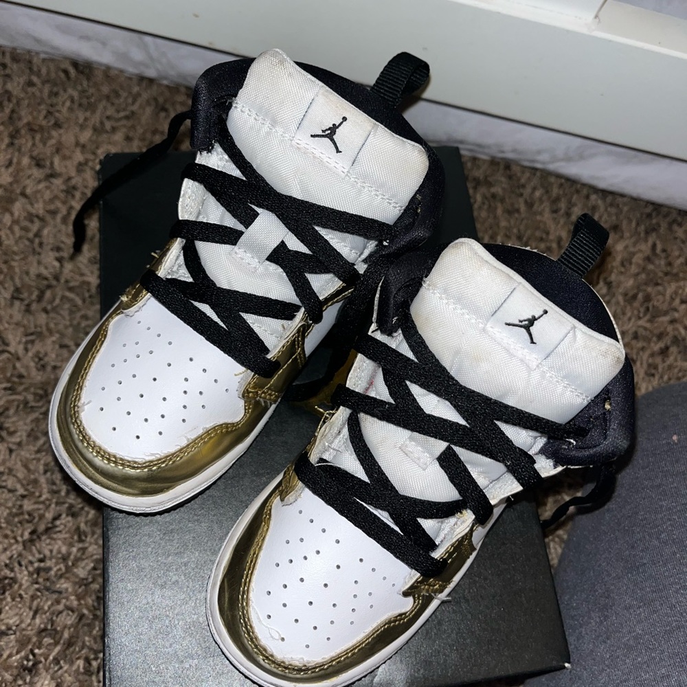 Metallic gold Jordan’s